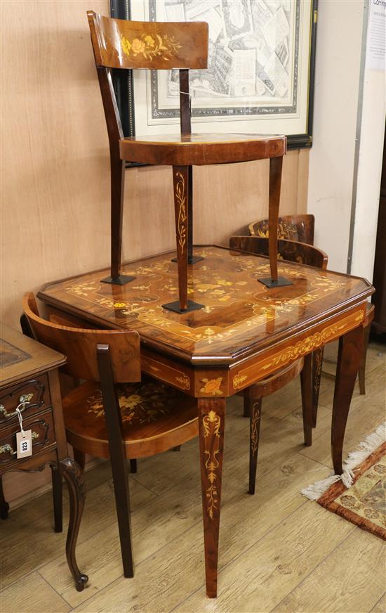 A Sorrento marquetry games table and four matching chairs W.79cm
